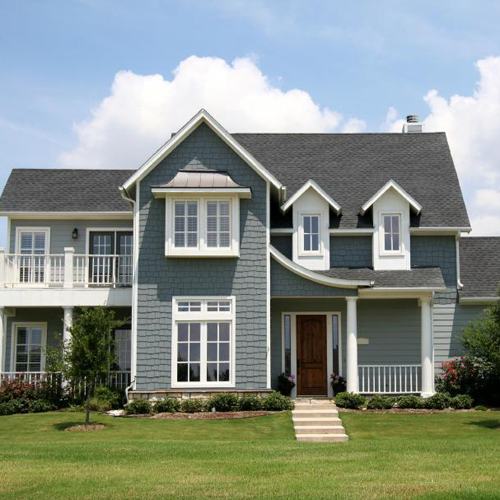 Beautiful large home with new gray exterior paint